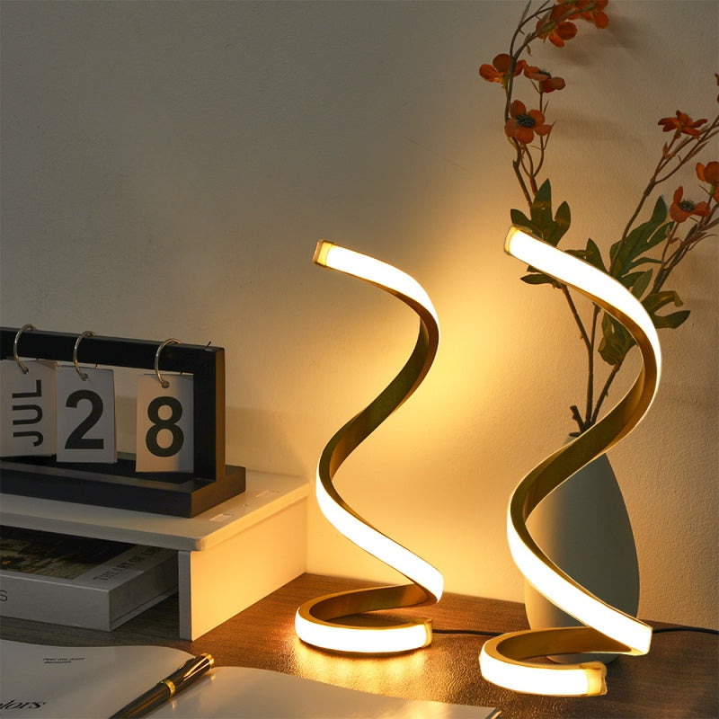 Galaxy Star Lamp LED desk lamp with spiral design, three-color adjustable lighting, soft and eye-friendly for bedroom, living room, or decor.