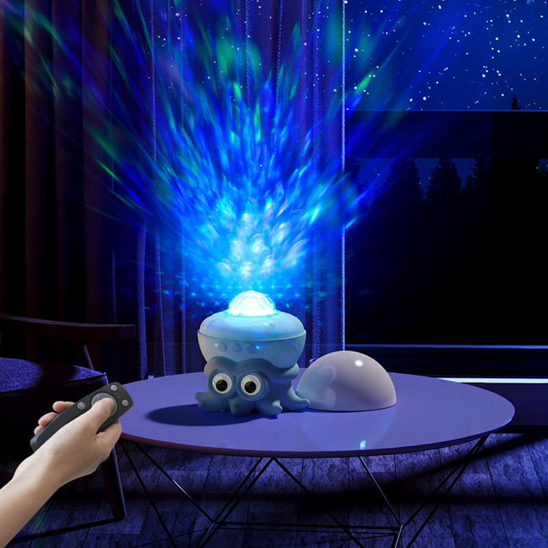 Light projector with remote control creating a starry night effect in a dark room.
